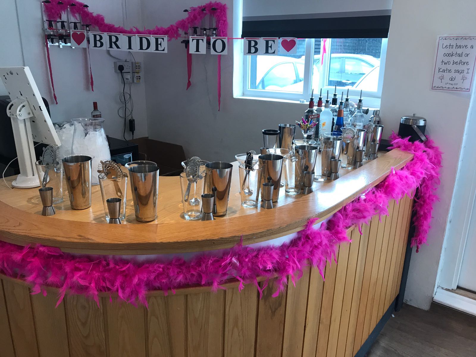 A mobile gin tasting laid out on a long table for a hen group