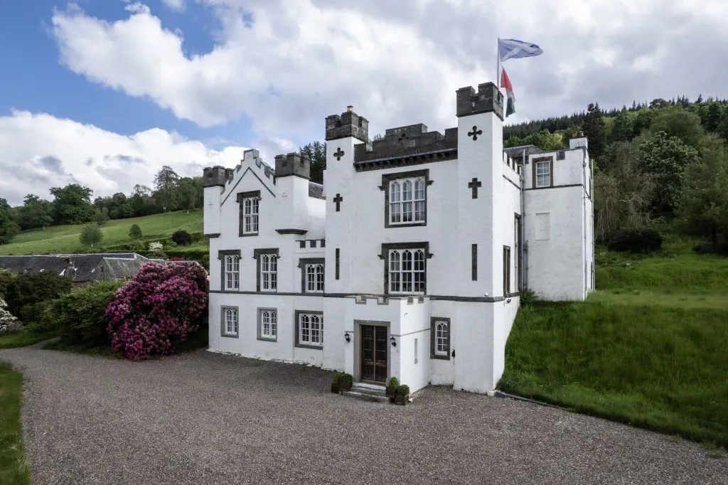 The Dram House, a white crenellated baronial house near Aberfeldy, Highland Perthshire