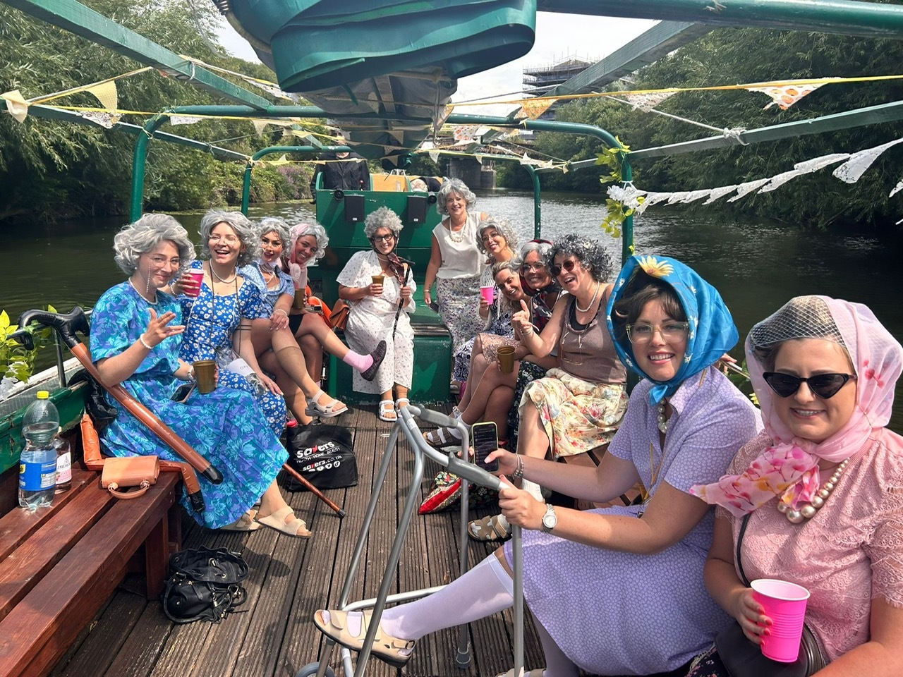 Hen group on a private canal boat up the River Avon with fizz in hand