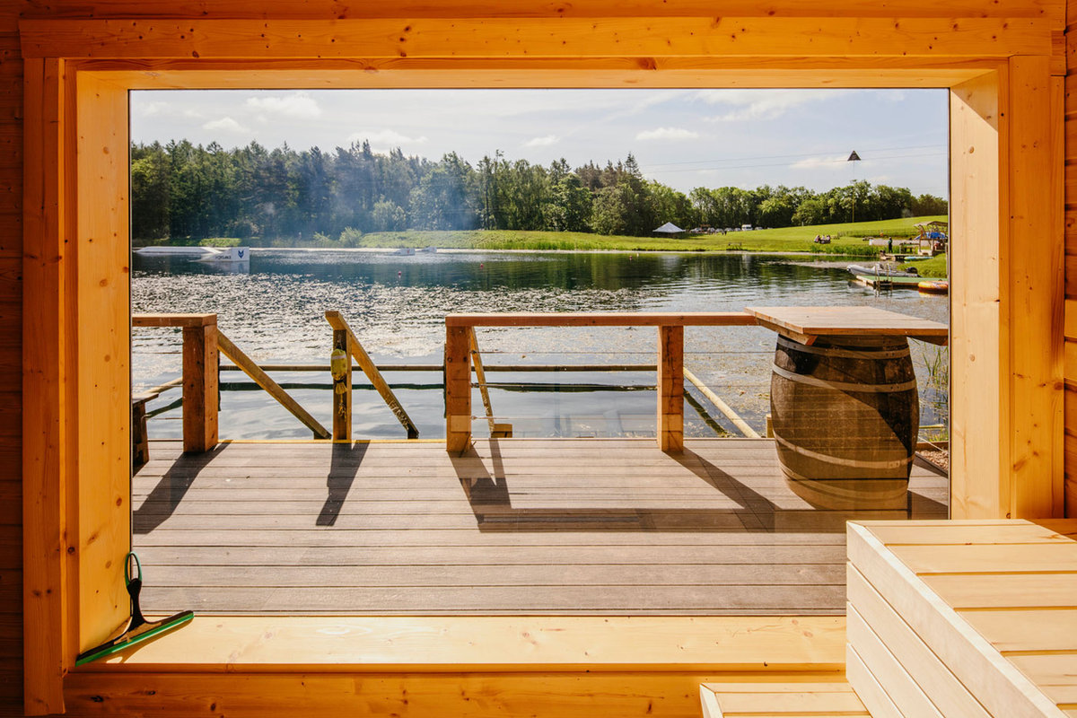 Lake view from inside the Hot Fox sauna at Foxlake, East Lothian
