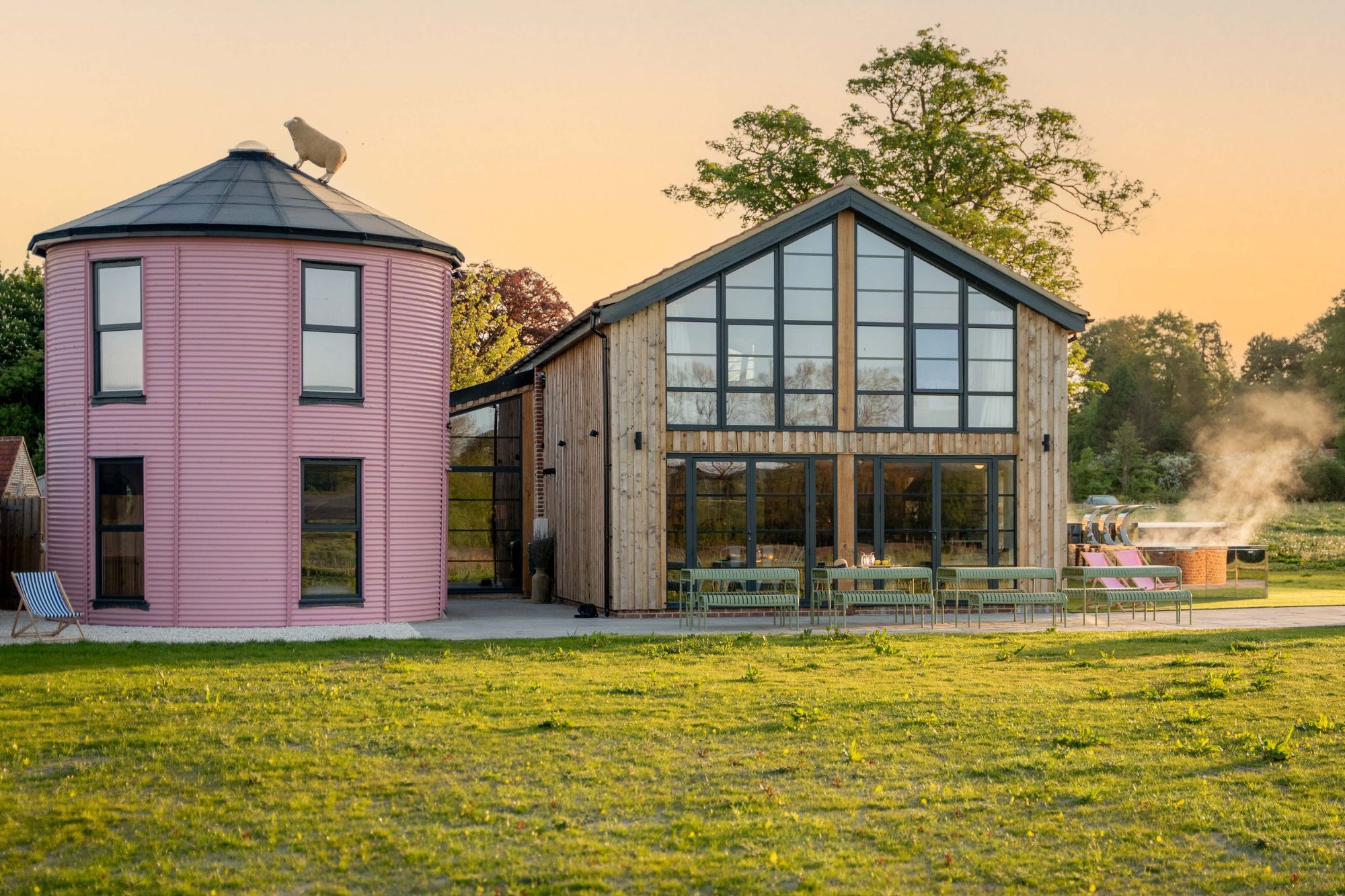 Country property near Bath set up for a hen weekend, with hot tub and fire pit at sunset